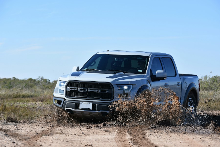 Vehicle driving through mud